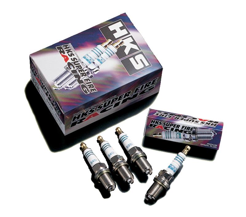 HKS Super Fire Racing M40G spark plugs shown in a group, featuring platinum tips and metal shells for high-performance engine ignition.